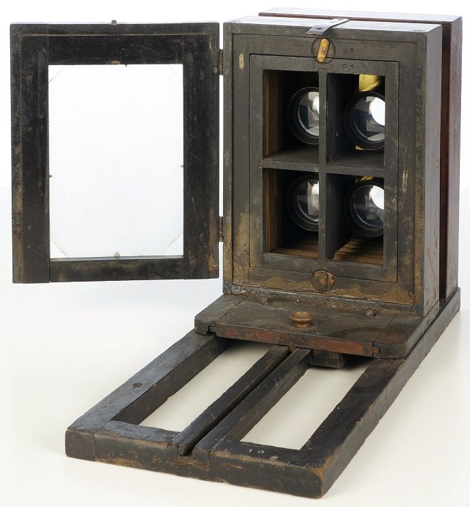 Rear view of Bon Ton View Box showing the collion staining and mask to produce four images on a single ferrotype plate.